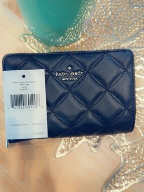 kate spade Quilted Compact Bifold Wallet in Black with Gold Logo